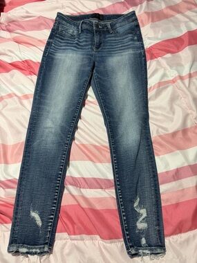 Buckle Black Skinny Jeans - Distressed Medium Blue Wash